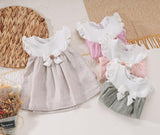 Summer dress with a pink bow