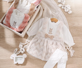 Winter dress with fur, two straps, and a bow.